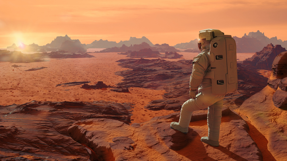 Astronaut on planet Mars watching the rising Sun (3d space illustration