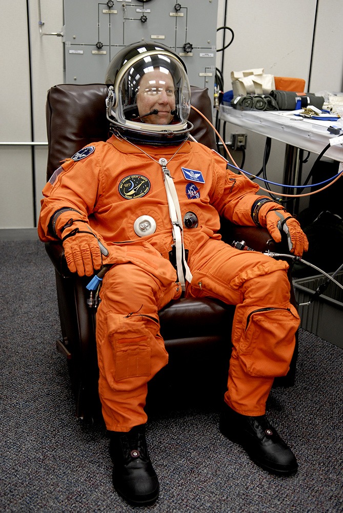 An astronaut wearing the Advanced Crew Space Suit