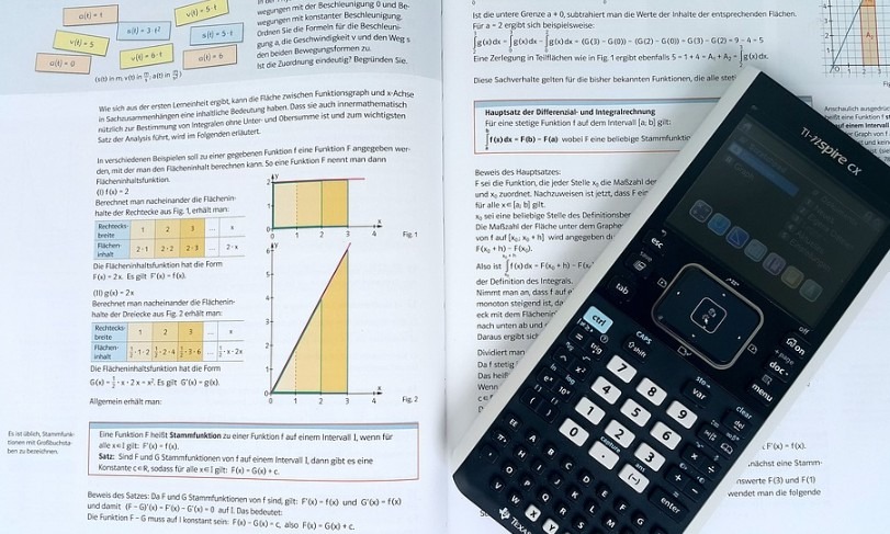 a Math book with a calculator on it