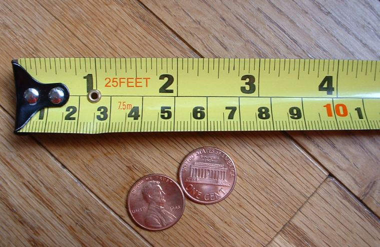 A tape measure with both metric and imperial units