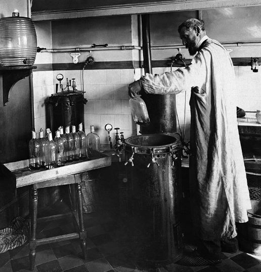 Louise Pasteur experimenting on bacteria