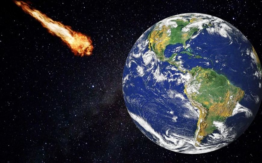 An artist’s illustration of an asteroid approaching the Earth. 