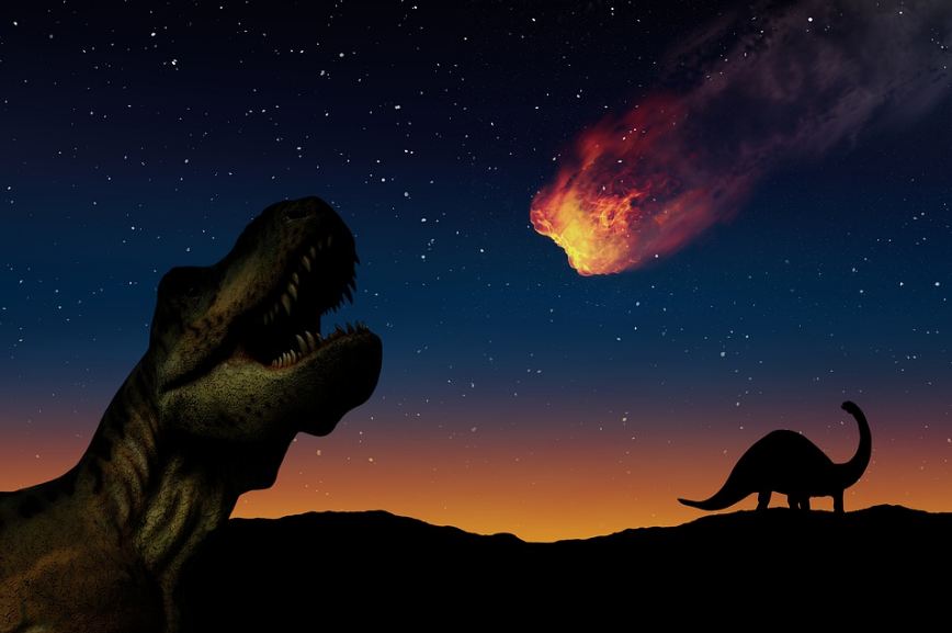 An image showing an asteroid approaching dinosaurs. 