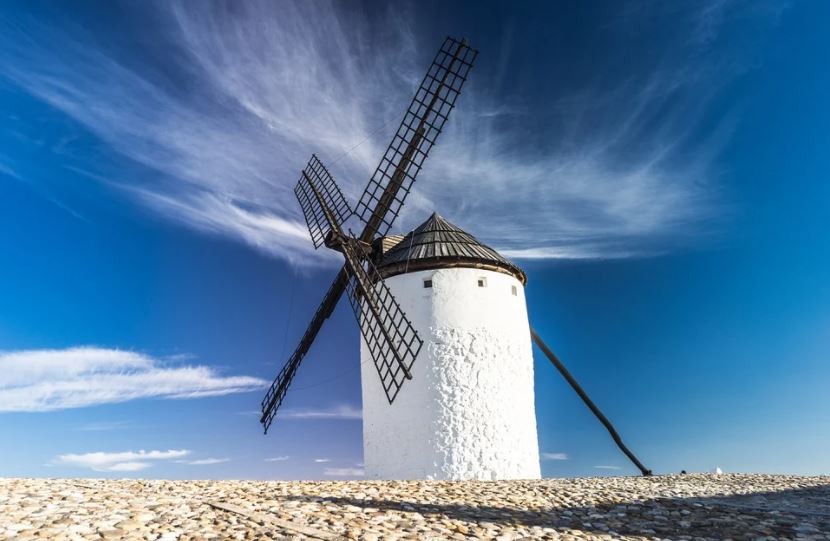 Single-windmill-against-a-blue-sky