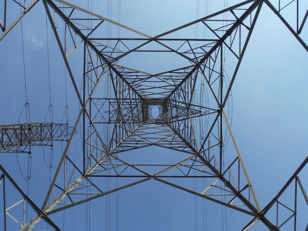 Electric transmission tower view from below